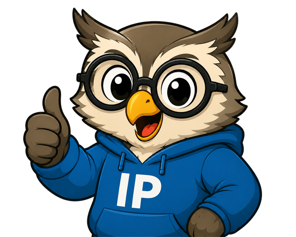 Percival, wearing a blue IP hoodie and glasses, giving a thumbs up